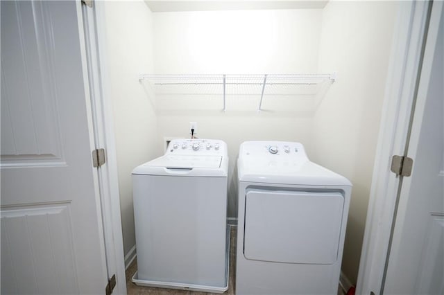 458 Bishop Ln, Woodstock, GA 30188 - laundry area with washing machine and clothes dryer