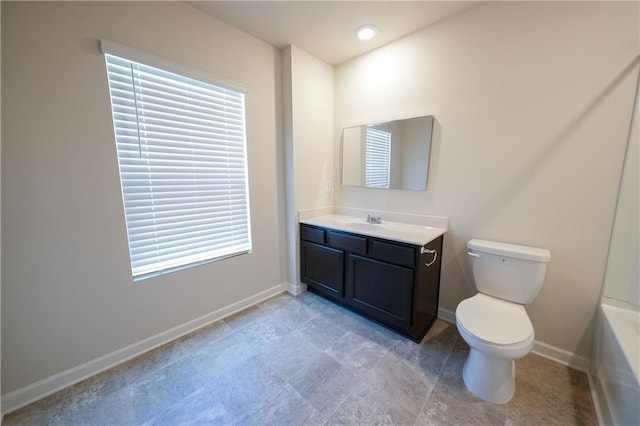 458 Bishop Ln, Woodstock, GA 30188 - full bath with baseboards, vanity, toilet, and a bathtub