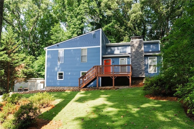 674 Crespan Ct, Lawrenceville, GA 30044 - back of property with stairway, a deck, a lawn, and view of scattered trees