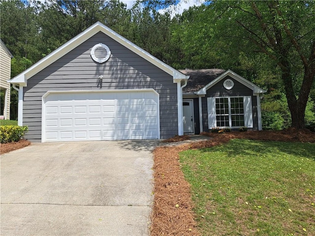 single story home with driveway and a front yard