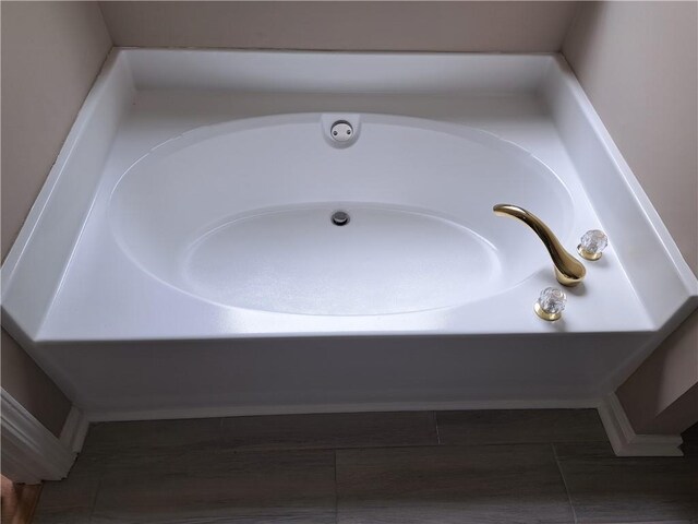 room details featuring a garden tub
