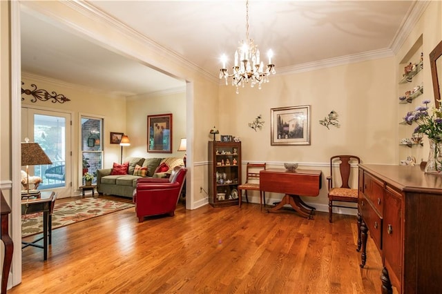 3833 Savannah Sq E, Atlanta, GA 30340 - living area with crown molding, wood finished floors, and a chandelier