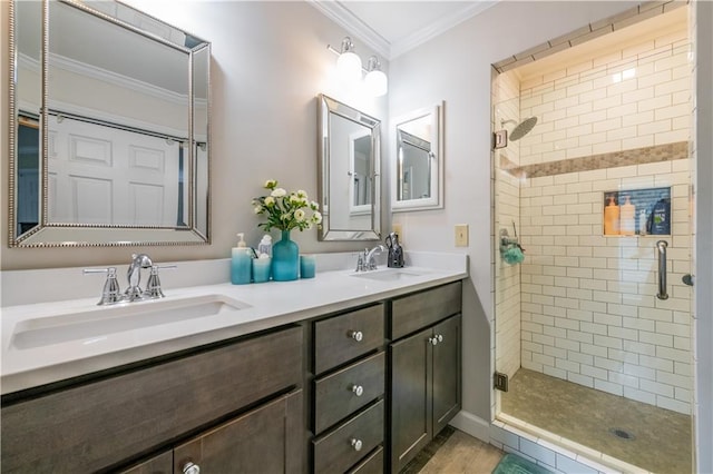 3833 Savannah Sq E, Atlanta, GA 30340 - full bathroom featuring a shower stall, ornamental molding, double vanity, and wood finished floors