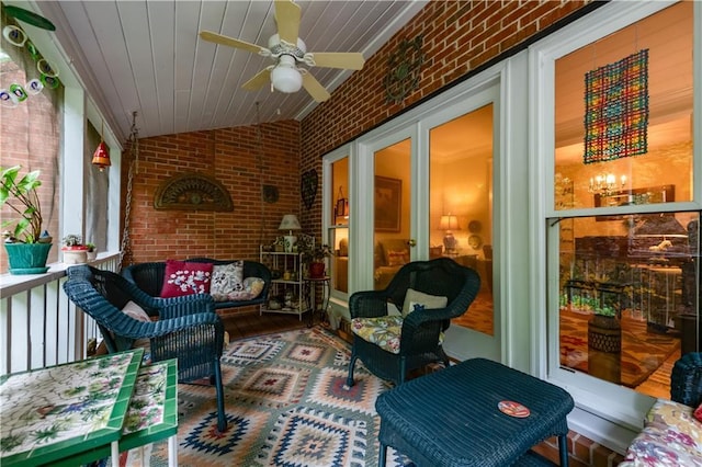 3833 Savannah Sq E, Atlanta, GA 30340 - sunroom featuring brick wall, ceiling fan, outdoor lounge area, and vaulted ceiling