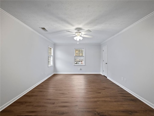 unfurnished room featuring a textured ceiling, crown molding, ceiling fan, and dark wood-type flooring