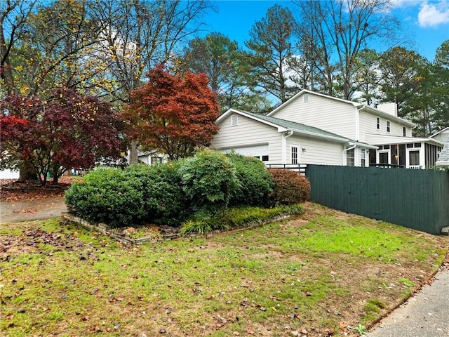 view of property exterior featuring a garage