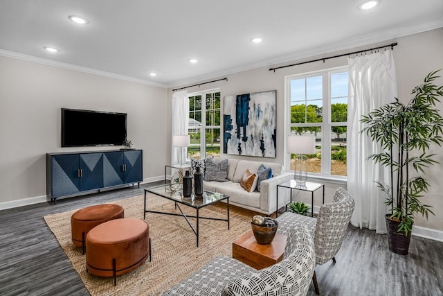 living room featuring ornamental molding, dark hardwood / wood-style flooring, and plenty of natural light