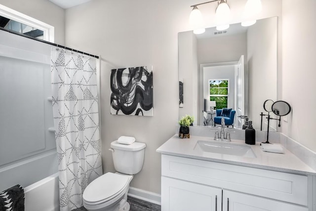 full bathroom featuring shower / tub combo, hardwood / wood-style flooring, vanity, and toilet