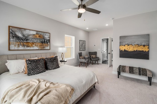 bedroom featuring light carpet and ceiling fan