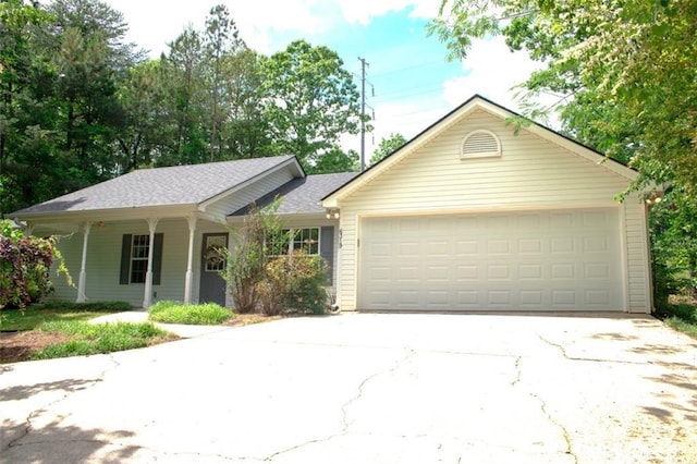 6319 River Plantation Dr, Lula, GA 30554 - ranch-style home with concrete driveway, a garage, and a porch