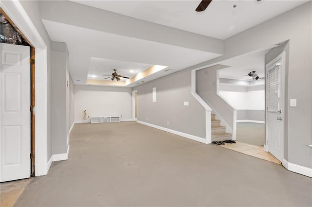 basement featuring ceiling fan