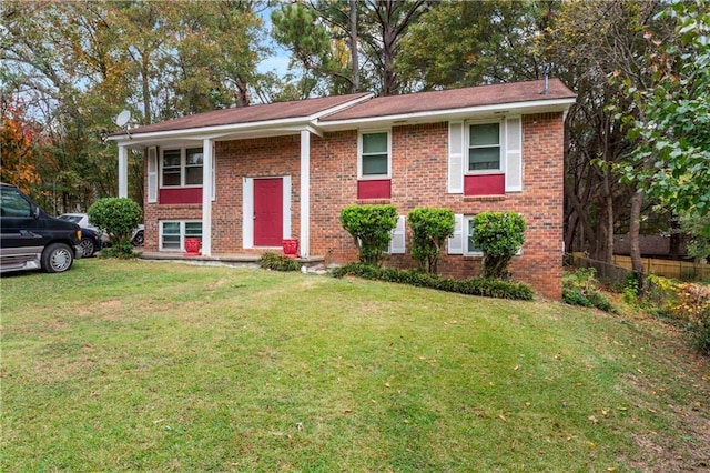 bi-level home with a front yard