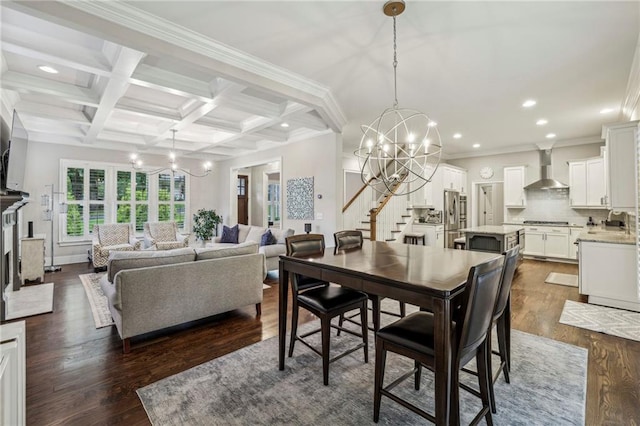2585 Drew Valley Rd NE, Brookhaven, GA 30319 - dining room featuring a chandelier, recessed lighting, beamed ceiling, coffered ceiling, and stairs