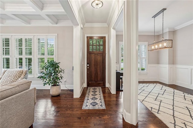 2585 Drew Valley Rd NE, Brookhaven, GA 30319 - foyer featuring healthy amount of natural light, dark wood-type flooring, ornamental molding, beam ceiling, and a wainscoted wall