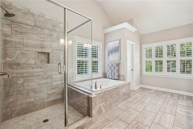 2585 Drew Valley Rd NE, Brookhaven, GA 30319 - full bath with a garden tub, vaulted ceiling, plenty of natural light, a stall shower, and baseboards