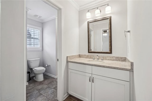 2585 Drew Valley Rd NE, Brookhaven, GA 30319 - bathroom featuring ornamental molding, vanity, toilet, and baseboards