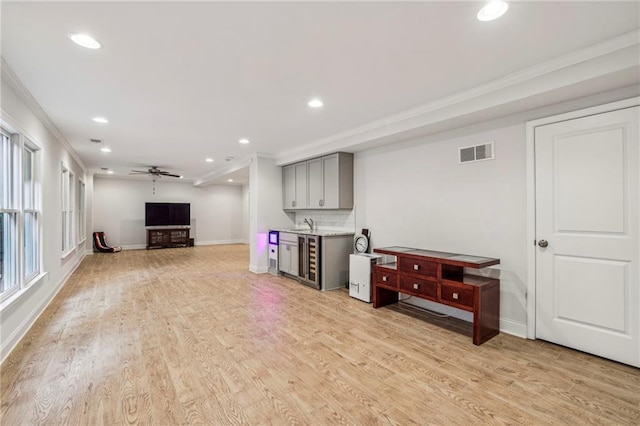 2585 Drew Valley Rd NE, Brookhaven, GA 30319 - living area with ornamental molding, recessed lighting, light wood-type flooring, baseboards, and ceiling fan