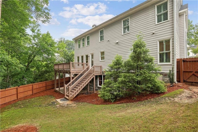 2585 Drew Valley Rd NE, Brookhaven, GA 30319 - back of property featuring a deck and stairs
