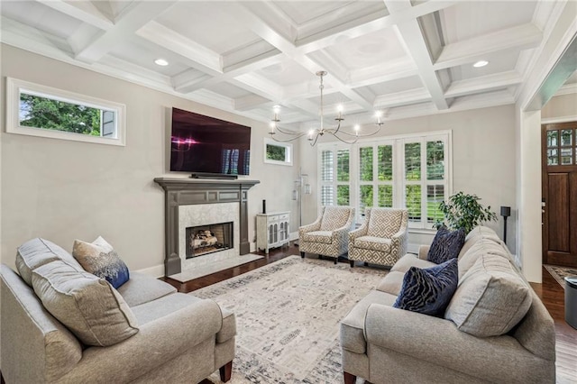 2585 Drew Valley Rd NE, Brookhaven, GA 30319 - living area with wood finished floors, coffered ceiling, a chandelier, beam ceiling, and a high end fireplace
