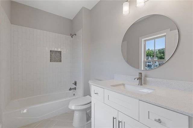 full bathroom with vanity, toilet, tiled shower / bath combo, and tile patterned flooring