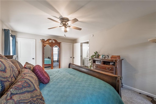 carpeted bedroom with baseboards and a ceiling fan