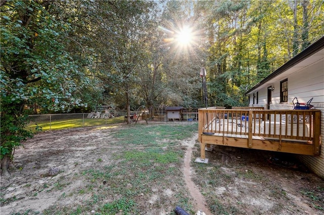 view of yard with a wooden deck