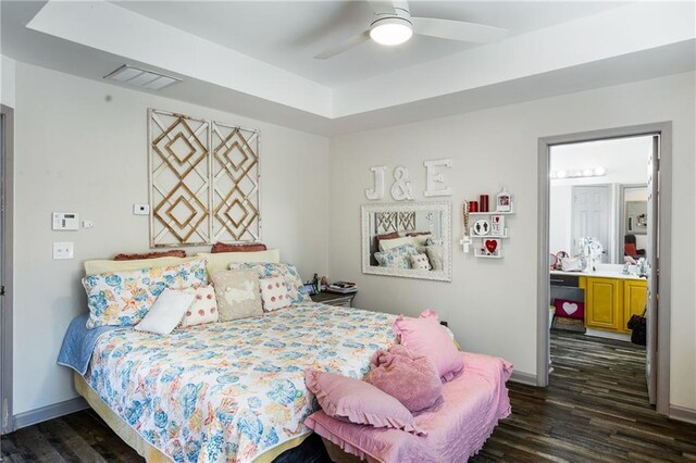 bedroom featuring visible vents, baseboards, and dark wood-style flooring