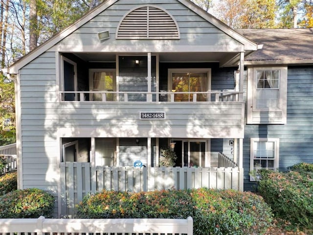 view of front of home with a balcony