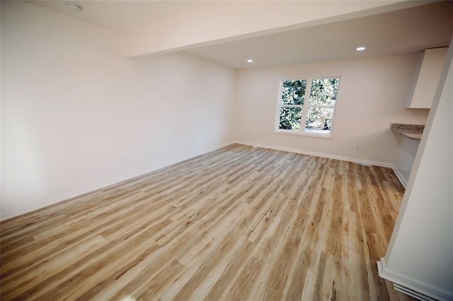 unfurnished room featuring light wood-type flooring