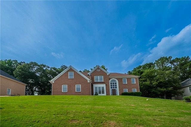 4495 Riders Ridge Trl, Snellville, GA 30039 - view of front of house with a front lawn and brick siding