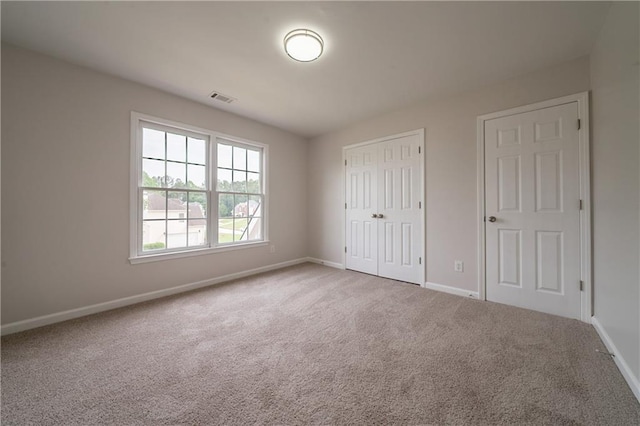4495 Riders Ridge Trl, Snellville, GA 30039 - unfurnished bedroom with carpet flooring, baseboards, and a closet