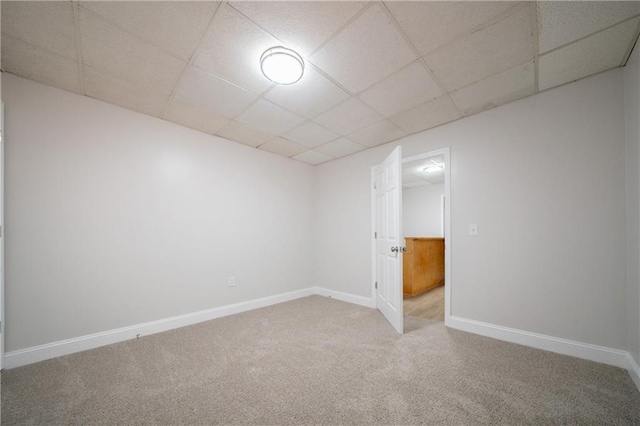 4495 Riders Ridge Trl, Snellville, GA 30039 - empty room featuring carpet floors, a paneled ceiling, and baseboards