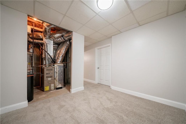 4495 Riders Ridge Trl, Snellville, GA 30039 - finished basement with carpet flooring, a paneled ceiling, and baseboards