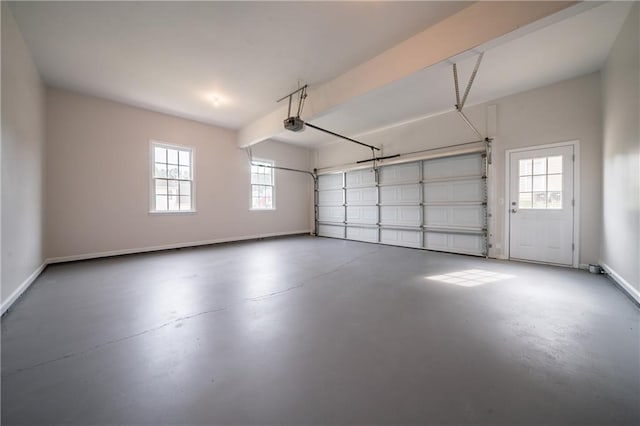 4495 Riders Ridge Trl, Snellville, GA 30039 - garage featuring baseboards and a garage door opener