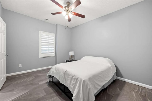 650 Ira St SW, Atlanta, GA 30312 - bedroom featuring visible vents, baseboards, and ceiling fan