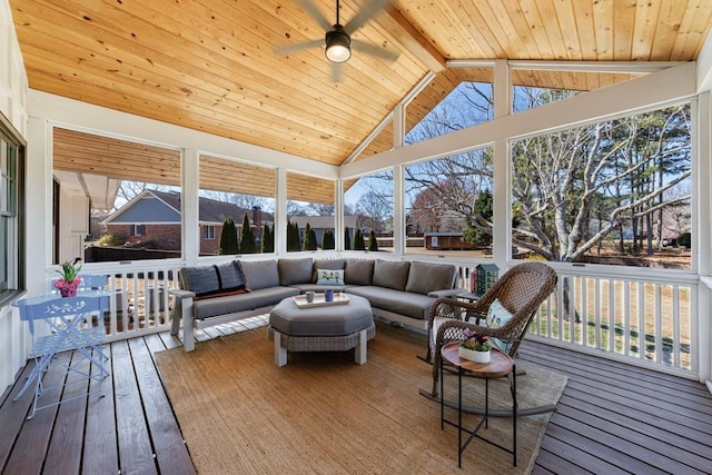 sunroom / solarium featuring vaulted ceiling with beams, ceiling fan, and wooden ceiling