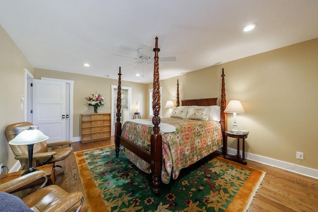 bedroom featuring recessed lighting, baseboards, and wood finished floors