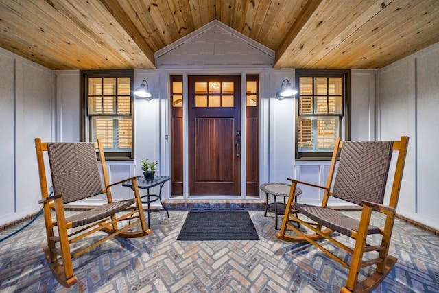 property entrance featuring covered porch