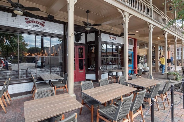 view of patio / terrace featuring ceiling fan and outdoor dining area