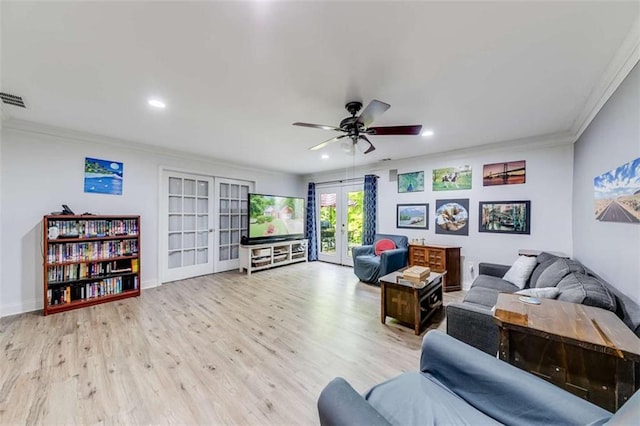 living room with ornamental molding, a ceiling fan, french doors, and recessed lighting