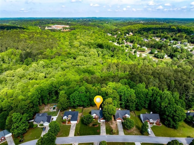 aerial view with a wooded view