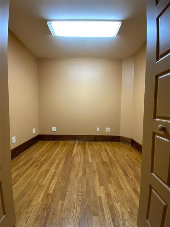 unfurnished room featuring light hardwood / wood-style floors