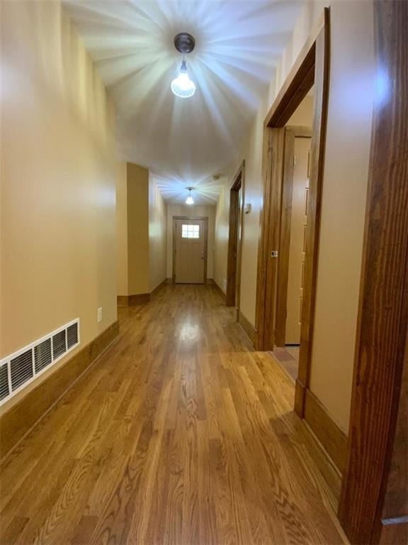 hall featuring light wood-type flooring