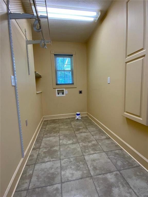 clothes washing area featuring electric dryer hookup and hookup for a washing machine