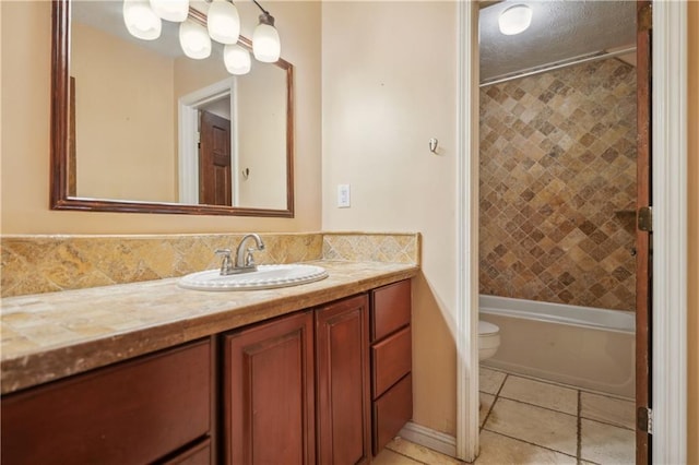 full bathroom with vanity, tile patterned flooring, shower / bathtub combination, toilet, and a textured ceiling