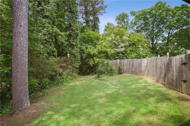 view of yard with fence