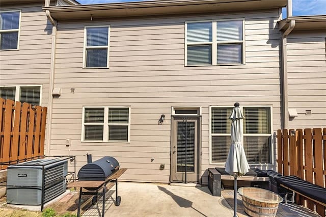 5008 Whiteoak Pointe SE Unit 15, Smyrna, GA 30080 - back of house with a patio and central air condition unit