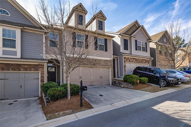 5008 Whiteoak Pointe SE Unit 15, Smyrna, GA 30080 - townhome / multi-family property featuring an attached garage, concrete driveway, and brick siding