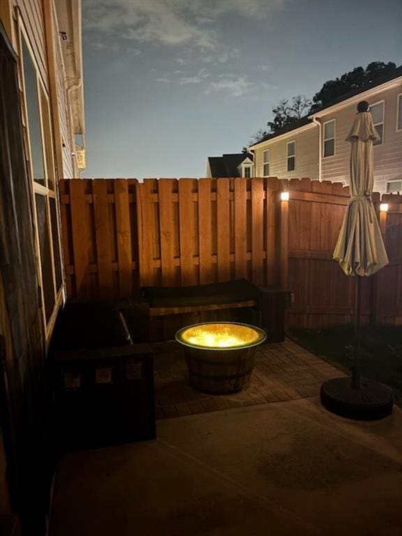 5008 Whiteoak Pointe SE Unit 15, Smyrna, GA 30080 - view of patio with a fire pit