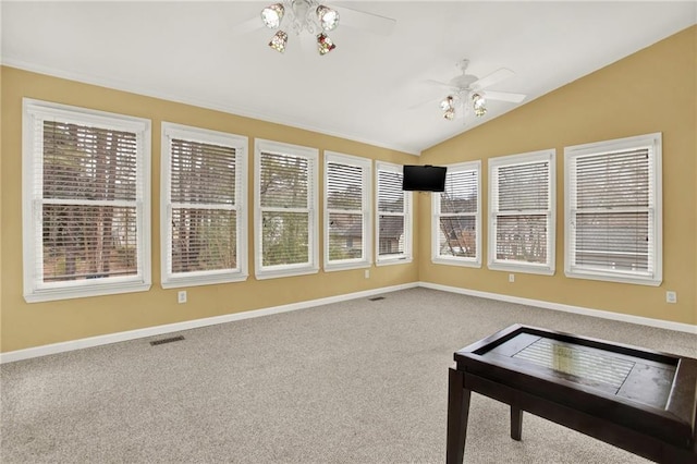 sunroom / solarium featuring lofted ceiling and ceiling fan